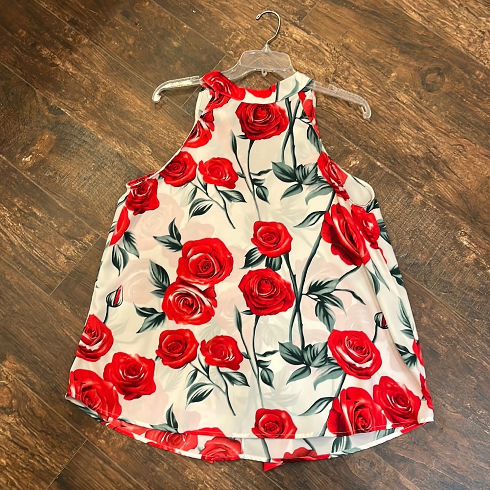 Gorgeous floral halter blouse. Size L. Bought from boutique.